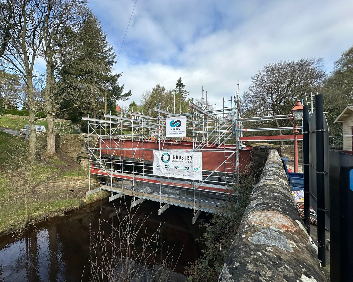 A railway bridge under refurbishment with full scaffold access